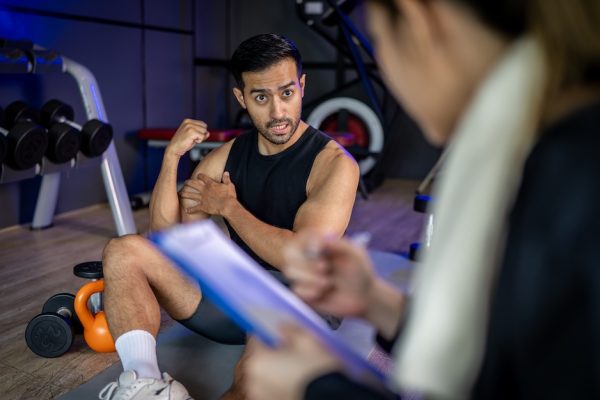 asian-man-and-woman-working-out-one-is-a-trainer-2025-03-15-23-04-26-utc.jpg
